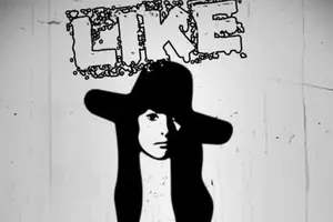 Cartel de LIKE en El Corral de las Cigüeñas